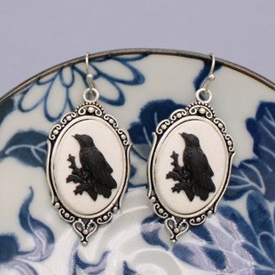 Regal Raven Silver Cameo Earrings